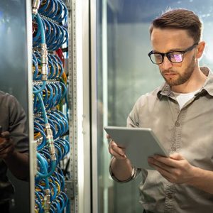 engineer-using-tablet-in-server-room-500px-1-300x300